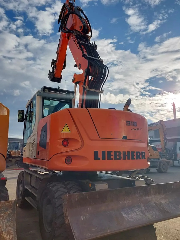 2014 Liebherr A 918Compact - Gumikerekes kotró: 3 kép. 2014 Liebherr A 918Compact - Gumikerekes kotró: 3 kép.
