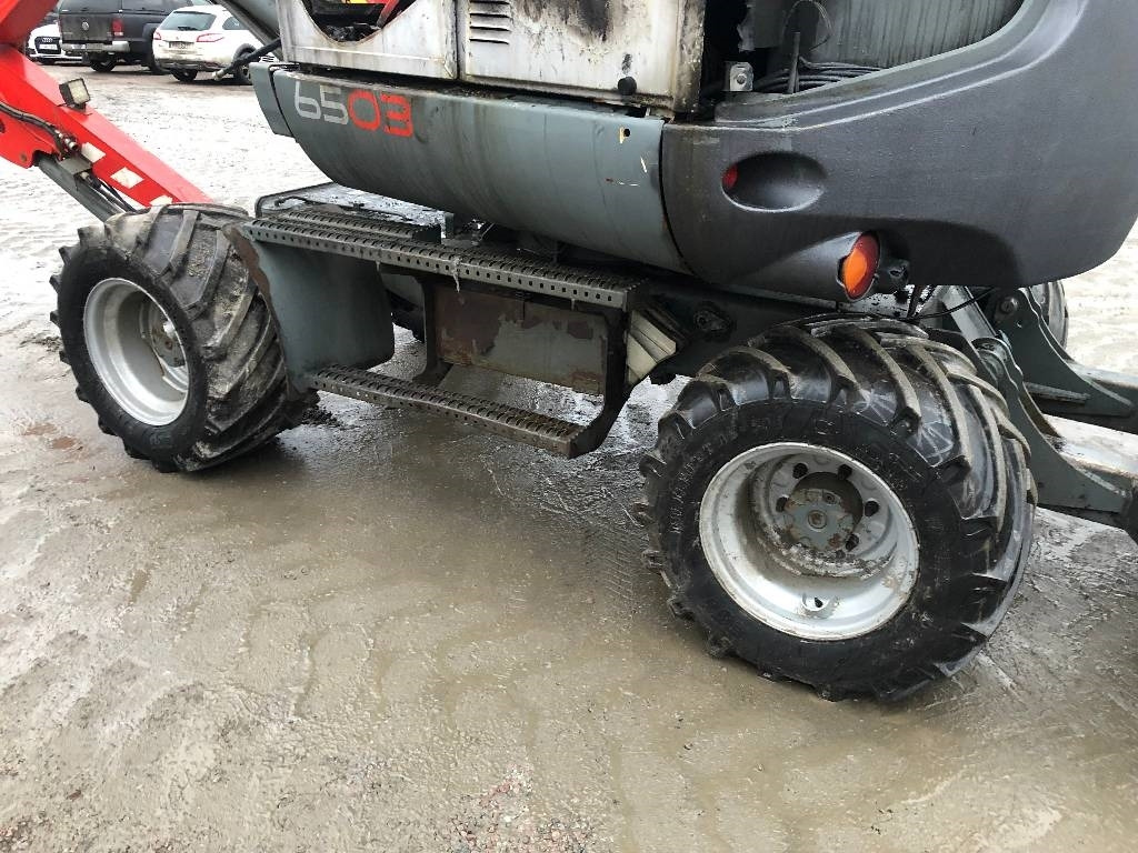 Neuson 6503 Dismantled: only spare parts - Gumikerekes kotró: 4 kép. Neuson 6503 Dismantled: only spare parts - Gumikerekes kotró: 4 kép.