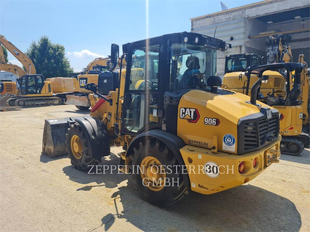 CAT 906-14 - Gumikerekes homlokrakodó: 4 kép. CAT 906-14 - Gumikerekes homlokrakodó: 4 kép.