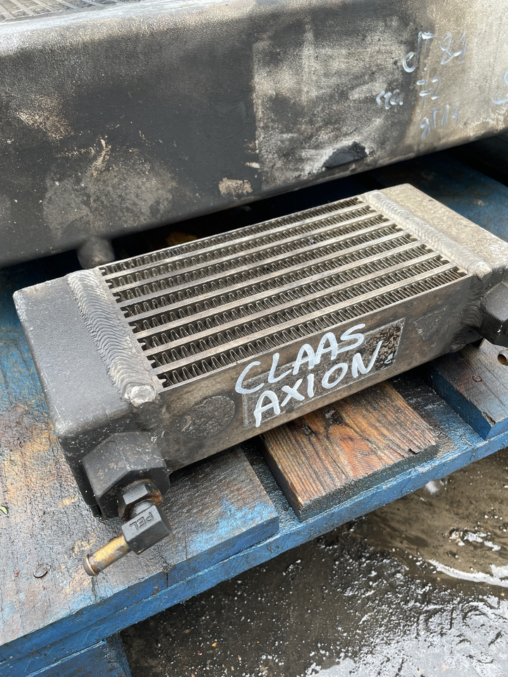 Claas Axion Arion - chłodnica oleju 0011198610 - Olajhűtő - Építőipari gépek: 1 kép. Claas Axion Arion - chłodnica oleju 0011198610 - Olajhűtő - Építőipari gépek: 1 kép.