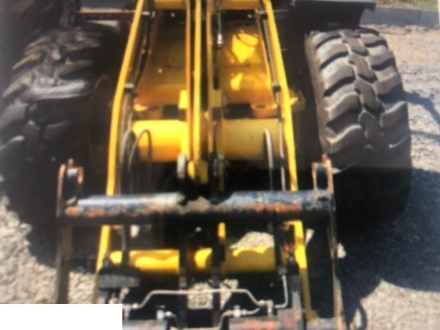 Yanmar V80 - Siłownik - Hidraulikus henger - Gumikerekes homlokrakodó: 3 kép. Yanmar V80 - Siłownik - Hidraulikus henger - Gumikerekes homlokrakodó: 3 kép.