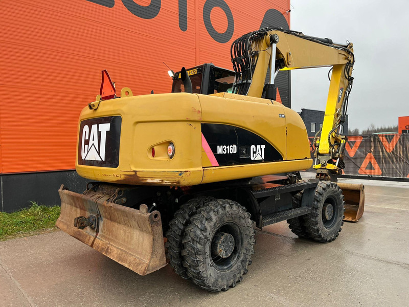 Caterpillar M316D / ROTOTILT/ AC / CENTRAL LUBRICATION / + EXTRA BUCKET - Gumikerekes kotró: 5 kép. Caterpillar M316D / ROTOTILT/ AC / CENTRAL LUBRICATION / + EXTRA BUCKET - Gumikerekes kotró: 5 kép.