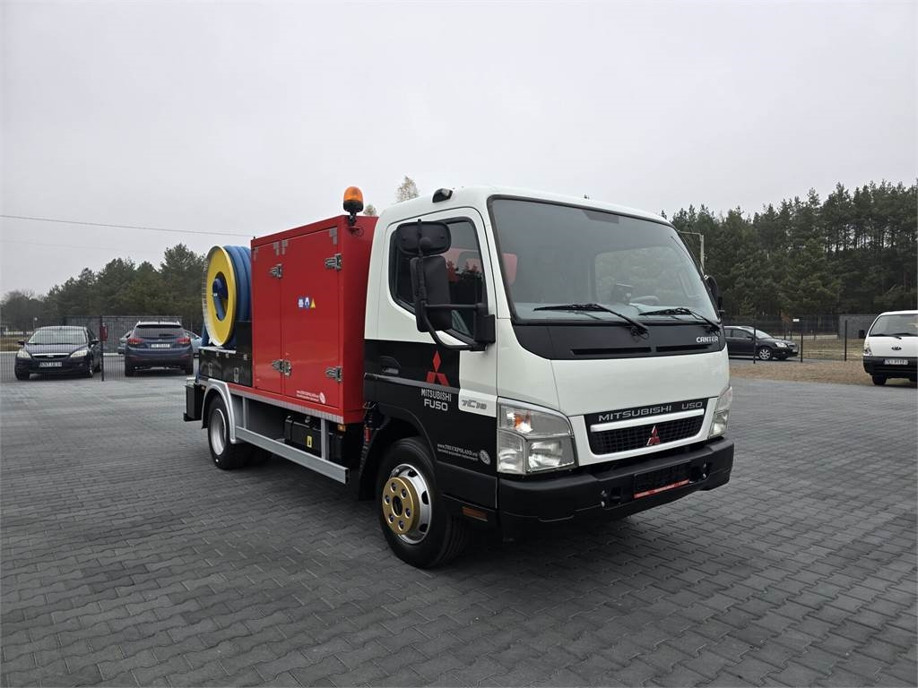 Mitsubishi RIONED COMBI WUKO - Szippantós autó: 2 kép. Mitsubishi RIONED COMBI WUKO - Szippantós autó: 2 kép.