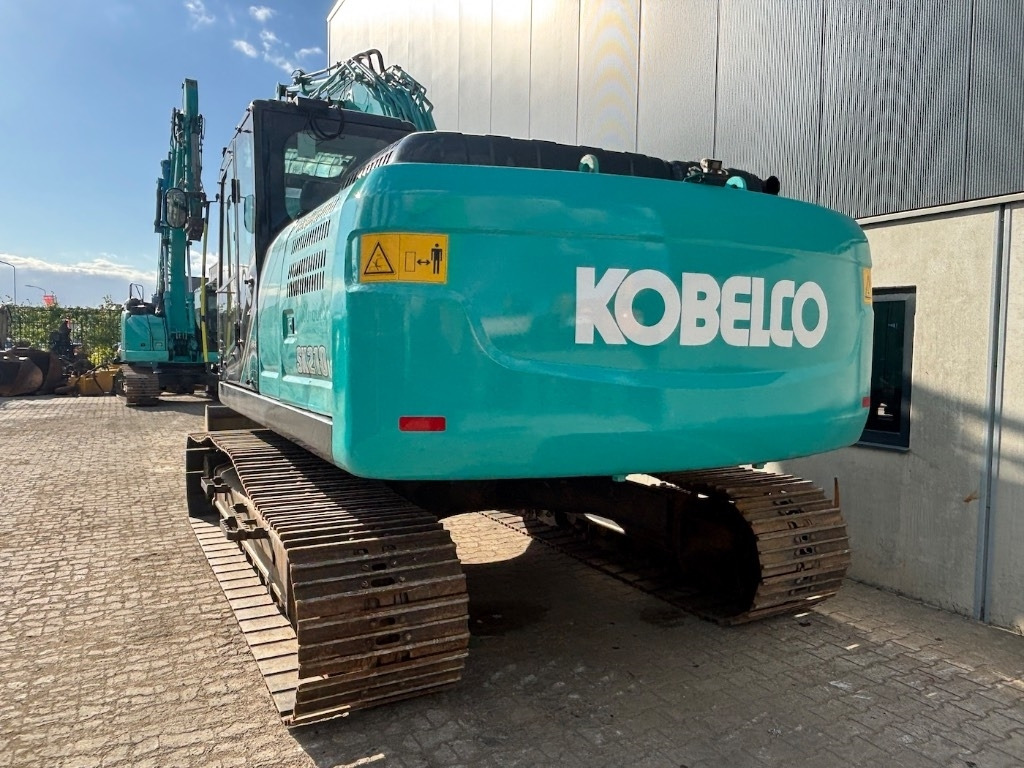 Kobelco SK 210 LC-10 - SK210 - SK210LC-10 - Lánctalpas kotró: 4 kép. Kobelco SK 210 LC-10 - SK210 - SK210LC-10 - Lánctalpas kotró: 4 kép.