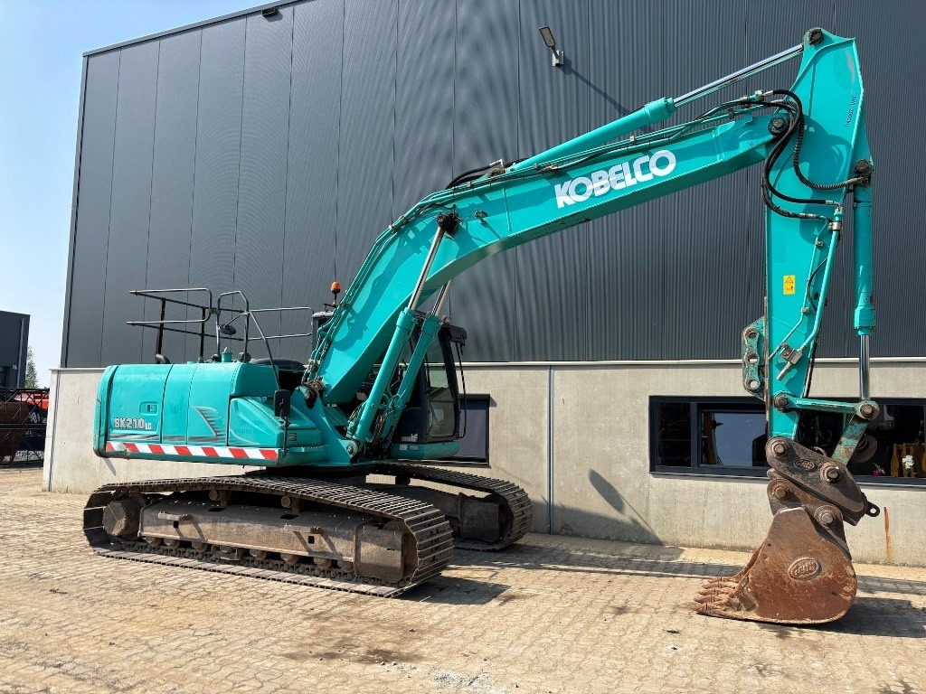 Kobelco SK 210 LC-9 - SK210 - SK 210 - Lánctalpas kotró: 5 kép. Kobelco SK 210 LC-9 - SK210 - SK 210 - Lánctalpas kotró: 5 kép.