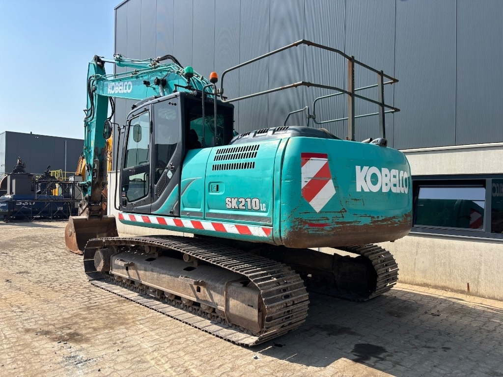 Kobelco SK 210 LC-9 - SK210 - SK 210 - Lánctalpas kotró: 3 kép. Kobelco SK 210 LC-9 - SK210 - SK 210 - Lánctalpas kotró: 3 kép.