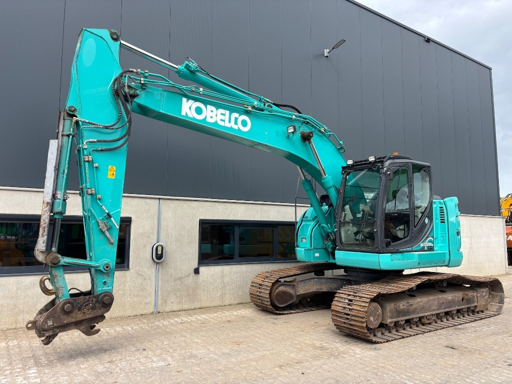 Kobelco SK 230 SR LC - SK230SRLC-5 - SK230 - Lánctalpas kotró: 1 kép. Kobelco SK 230 SR LC - SK230SRLC-5 - SK230 - Lánctalpas kotró: 1 kép.