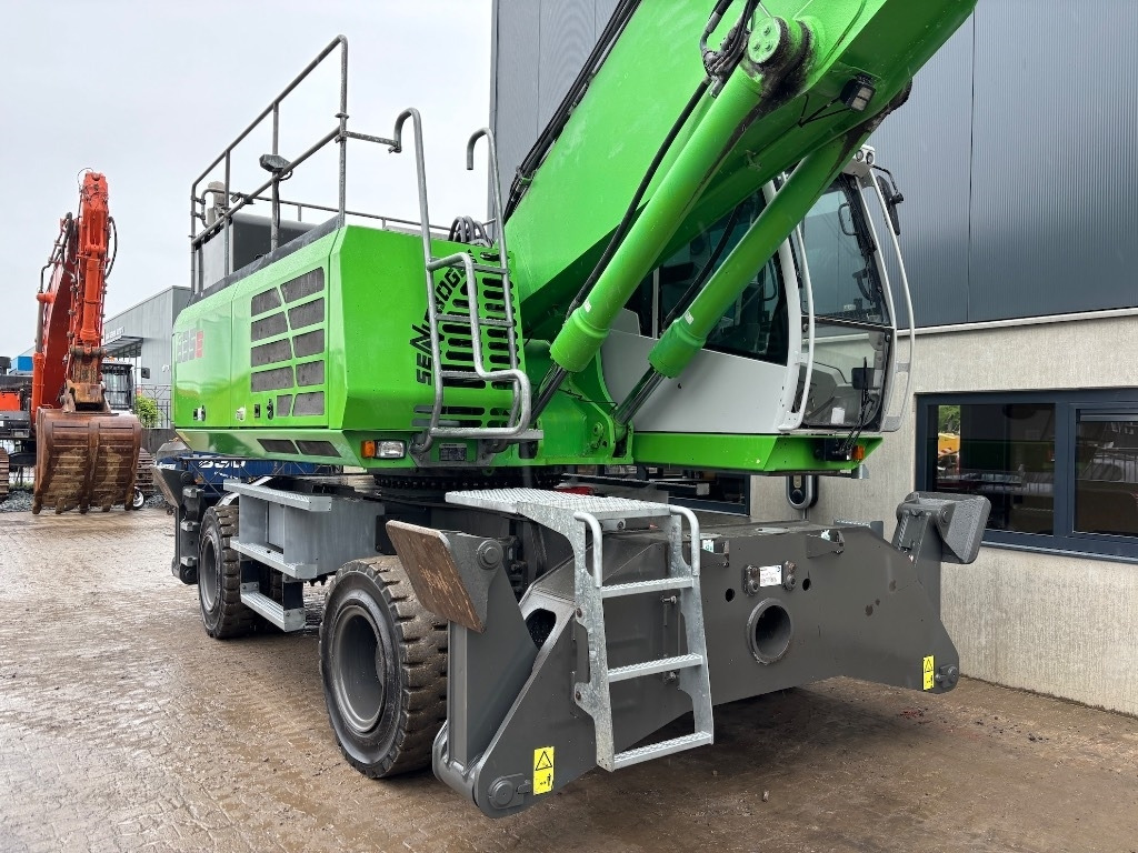 Hulladék kotró Sennebogen 835 M - 835 E - 835E - 835M: 14 kép. Hulladék kotró Sennebogen 835 M - 835 E - 835E - 835M: 14 kép.