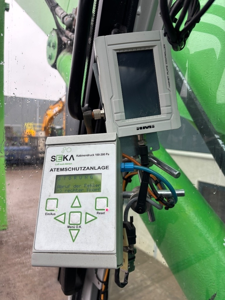 Hulladék kotró Sennebogen 835 M - 835 E - 835E - 835M: 23 kép. Hulladék kotró Sennebogen 835 M - 835 E - 835E - 835M: 23 kép.