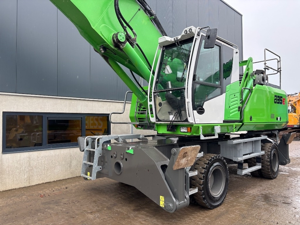 Hulladék kotró Sennebogen 835 M - 835 E - 835E - 835M: 17 kép. Hulladék kotró Sennebogen 835 M - 835 E - 835E - 835M: 17 kép.