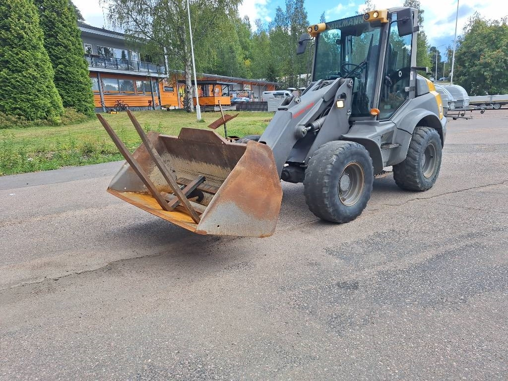 Ahlmann AF 1200 - Gumikerekes homlokrakodó: 4 kép. Ahlmann AF 1200 - Gumikerekes homlokrakodó: 4 kép.