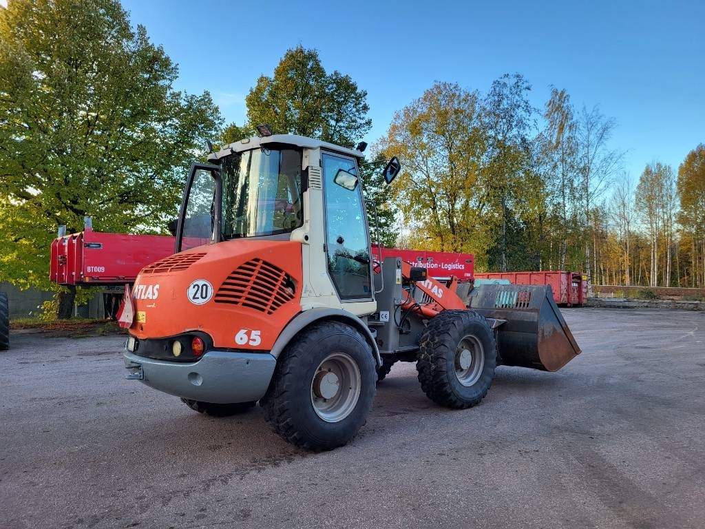 Atlas 65 - Gumikerekes homlokrakodó: 3 kép. Atlas 65 - Gumikerekes homlokrakodó: 3 kép.