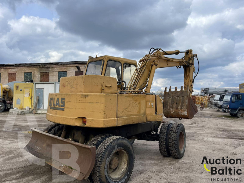 Atlas 1204 - Gumikerekes kotró: 4 kép. Atlas 1204 - Gumikerekes kotró: 4 kép.