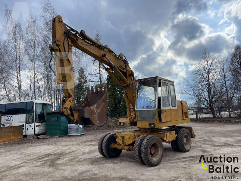 Atlas 1204 - Gumikerekes kotró: 3 kép. Atlas 1204 - Gumikerekes kotró: 3 kép.