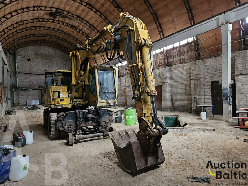 Atlas 1604 - Gumikerekes kotró: 2 kép. Atlas 1604 - Gumikerekes kotró: 2 kép.