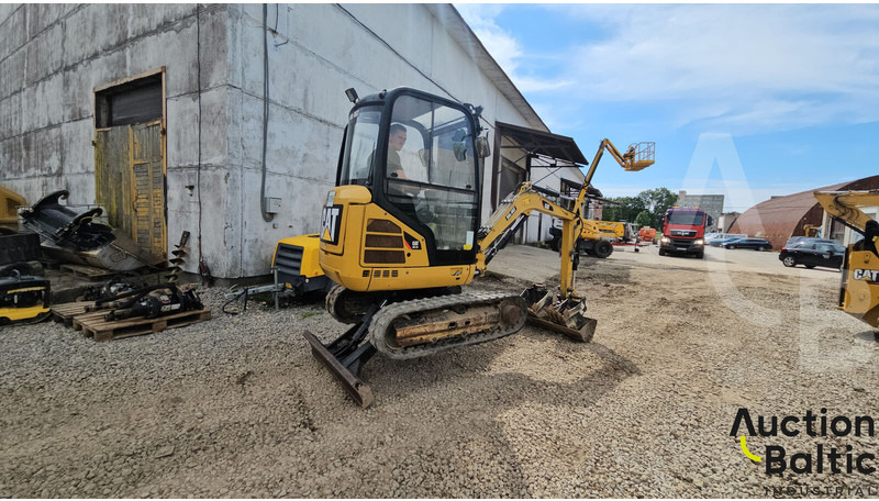 Caterpillar 302.4 D - Minikotró: 5 kép. Caterpillar 302.4 D - Minikotró: 5 kép.