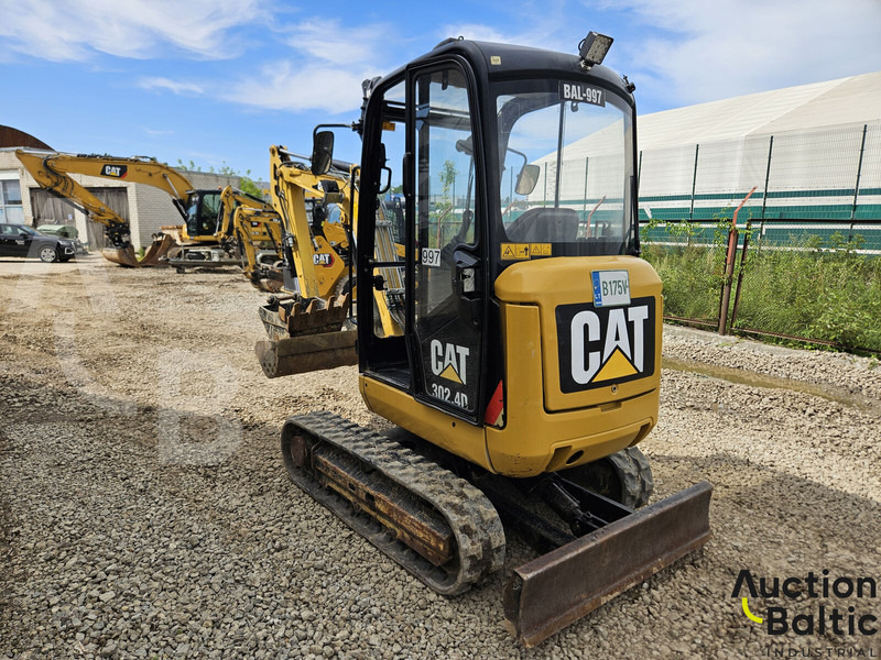 Caterpillar 302.4 D - Minikotró: 4 kép. Caterpillar 302.4 D - Minikotró: 4 kép.