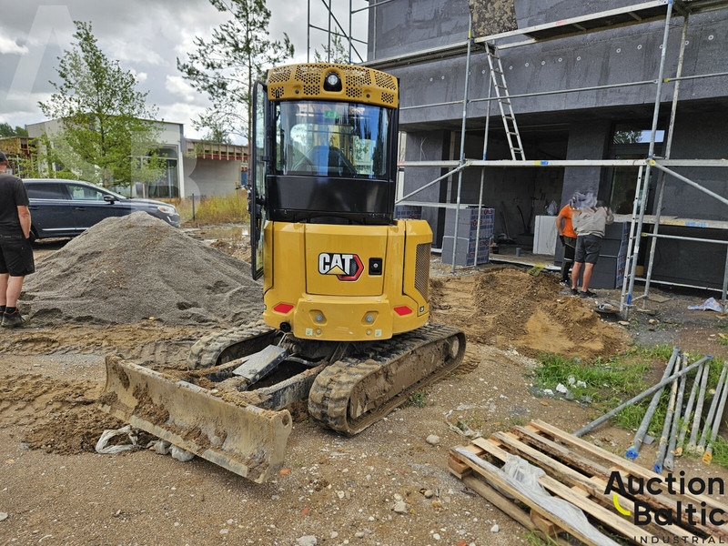 Caterpillar 303 CR - Minikotró: 4 kép. Caterpillar 303 CR - Minikotró: 4 kép.