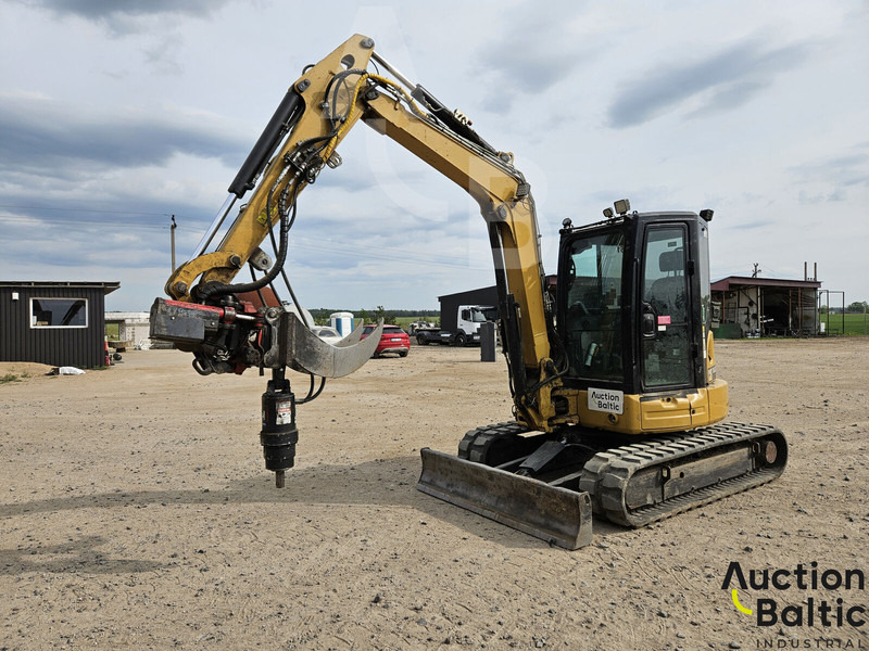Caterpillar 305.5E2CR - Minikotró: 1 kép. Caterpillar 305.5E2CR - Minikotró: 1 kép.