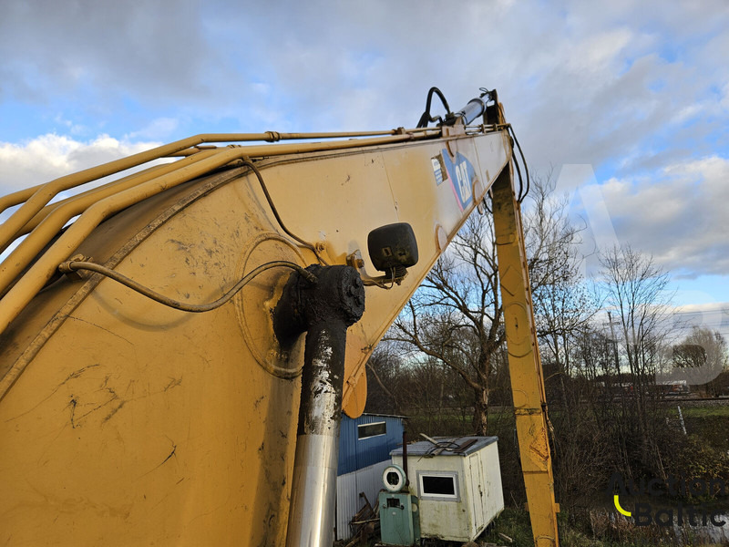 Lánctalpas kotró Caterpillar 320 EL: 13 kép.