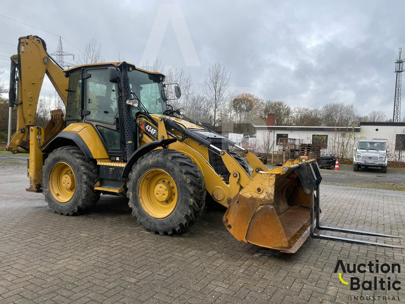Caterpillar 434 F2 - Kotrórakodó: 2 kép. Caterpillar 434 F2 - Kotrórakodó: 2 kép.