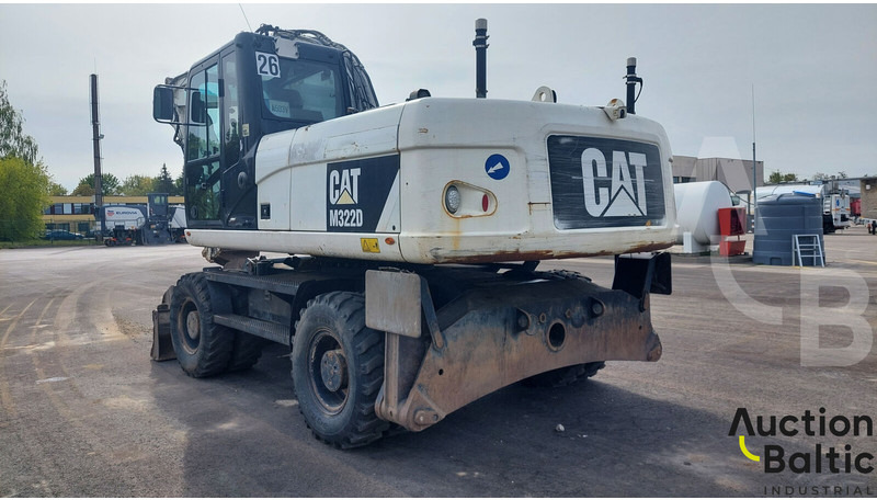 Caterpillar M 322 D - Gumikerekes kotró: 4 kép. Caterpillar M 322 D - Gumikerekes kotró: 4 kép.