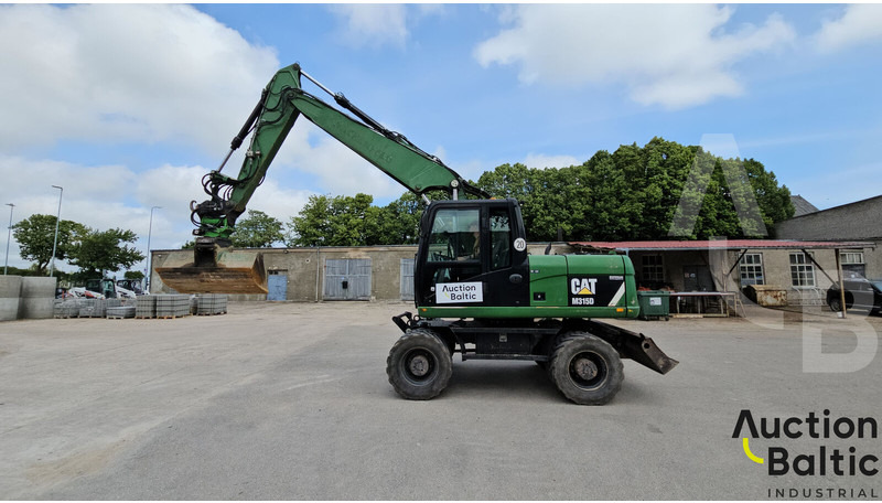 Caterpillar M315D - Gumikerekes kotró: 5 kép. Caterpillar M315D - Gumikerekes kotró: 5 kép.