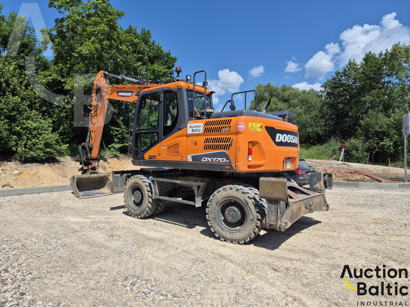 Doosan DX 170 W-5 - Gumikerekes kotró: 5 kép. Doosan DX 170 W-5 - Gumikerekes kotró: 5 kép.