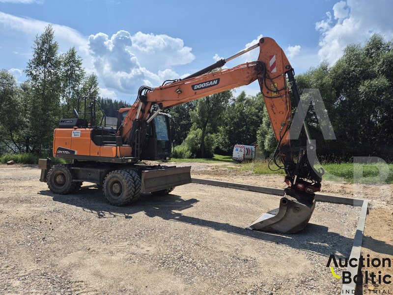 Doosan DX 170 W-5 - Gumikerekes kotró: 3 kép. Doosan DX 170 W-5 - Gumikerekes kotró: 3 kép.