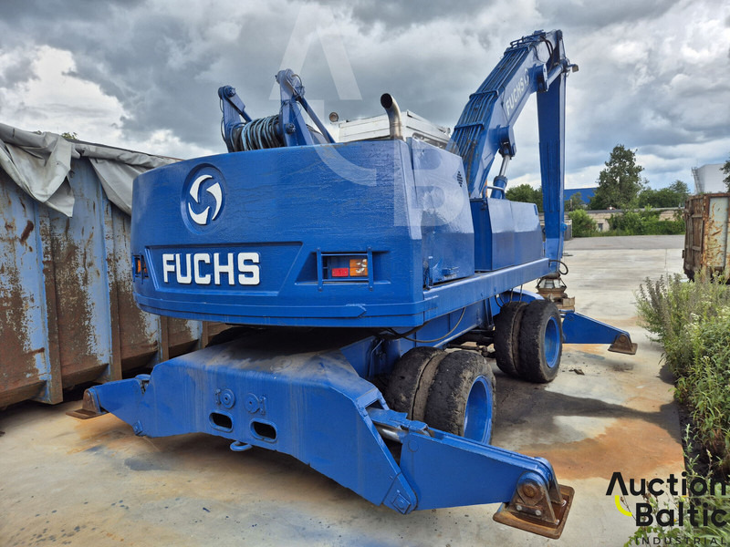 Fuchs MHL 331 - Gumikerekes kotró: 3 kép. Fuchs MHL 331 - Gumikerekes kotró: 3 kép.
