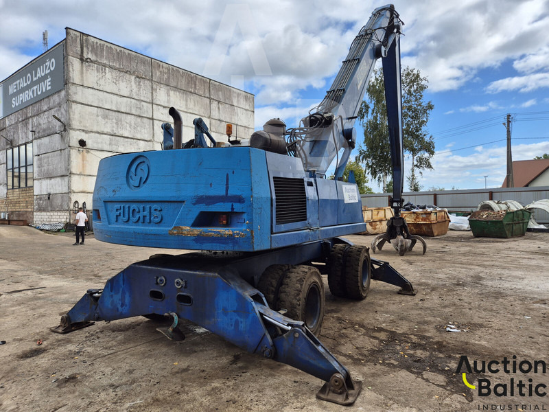Fuchs MHL 350 - Gumikerekes kotró: 3 kép. Fuchs MHL 350 - Gumikerekes kotró: 3 kép.