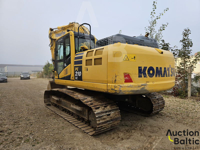 Komatsu PC210LC-11 - Lánctalpas kotró: 4 kép. Komatsu PC210LC-11 - Lánctalpas kotró: 4 kép.
