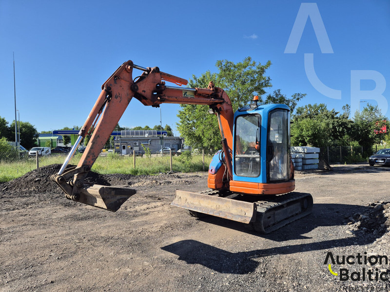 Komatsu PC50 - Minikotró: 2 kép. Komatsu PC50 - Minikotró: 2 kép.