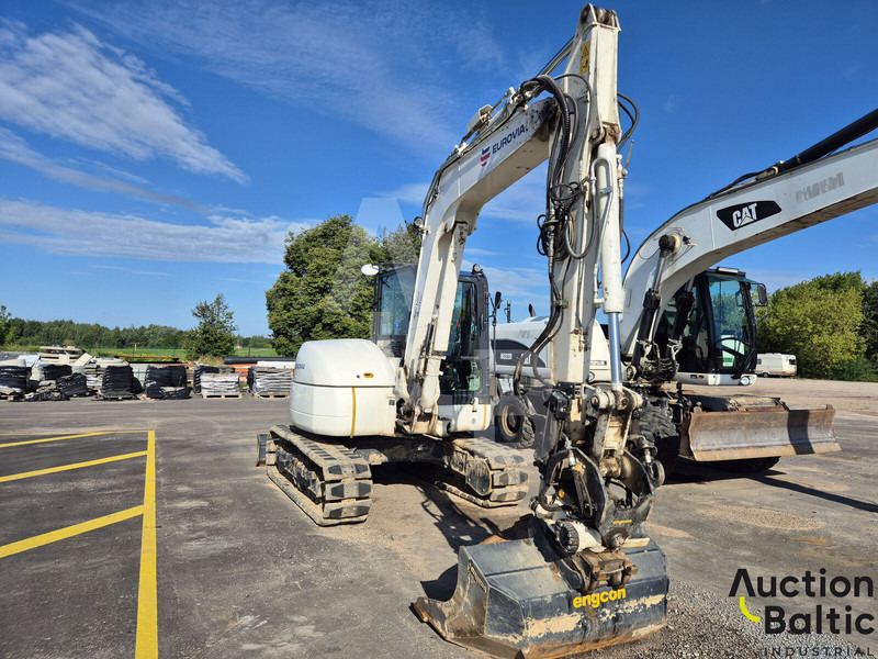 Komatsu PC80MR-3 - Minikotró: 2 kép. Komatsu PC80MR-3 - Minikotró: 2 kép.