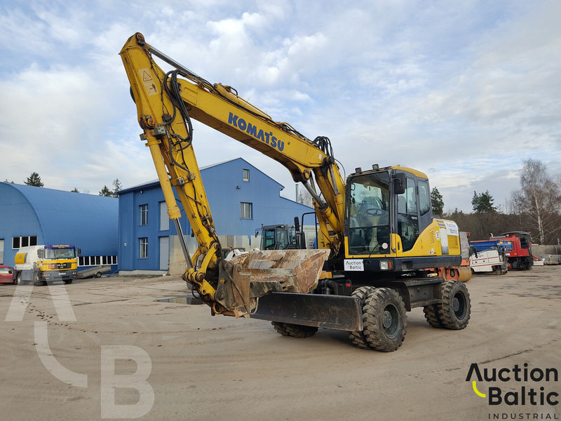Komatsu PW160-7 - Gumikerekes kotró: 1 kép. Komatsu PW160-7 - Gumikerekes kotró: 1 kép.