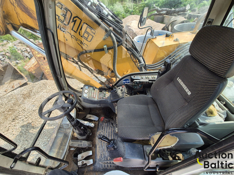 Liebherr A 316 Litronic - Gumikerekes kotró: 5 kép. Liebherr A 316 Litronic - Gumikerekes kotró: 5 kép.