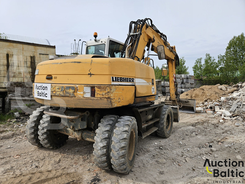 Liebherr A 316 Litronic - Gumikerekes kotró: 3 kép. Liebherr A 316 Litronic - Gumikerekes kotró: 3 kép.