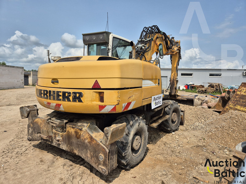 Liebherr A 316 Litronic - Gumikerekes kotró: 3 kép. Liebherr A 316 Litronic - Gumikerekes kotró: 3 kép.