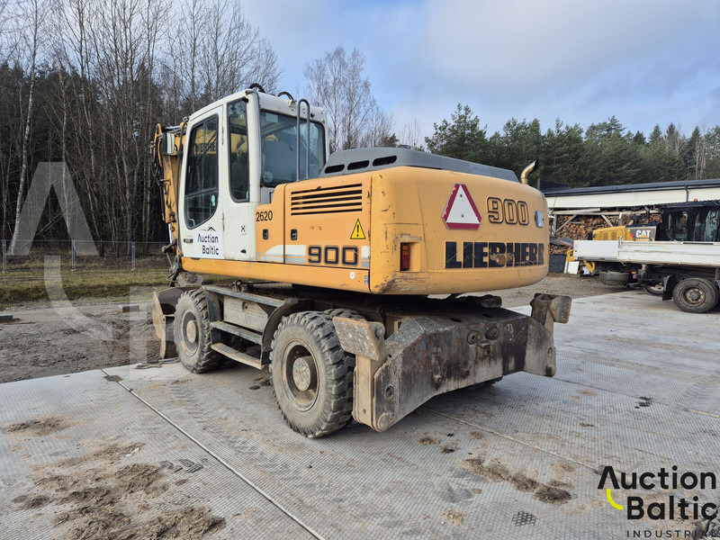 Liebherr A 900 C Litronic - Gumikerekes kotró: 5 kép. Liebherr A 900 C Litronic - Gumikerekes kotró: 5 kép.