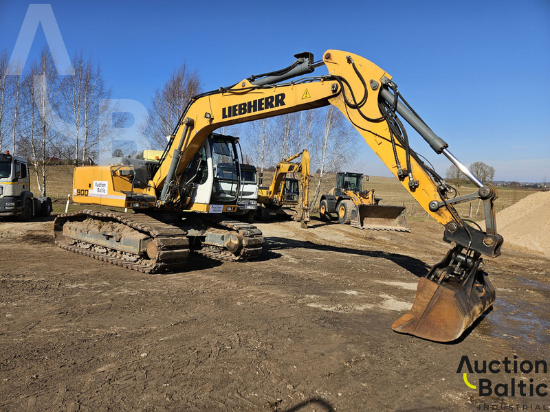 Liebherr R 900 C Litronic - Lánctalpas kotró: 2 kép. Liebherr R 900 C Litronic - Lánctalpas kotró: 2 kép.