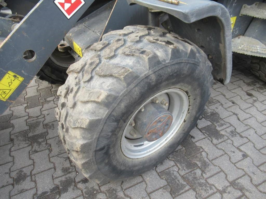 Terex TL80 Klappschaufel Gabel - Gumikerekes homlokrakodó: 5 kép. Terex TL80 Klappschaufel Gabel - Gumikerekes homlokrakodó: 5 kép.