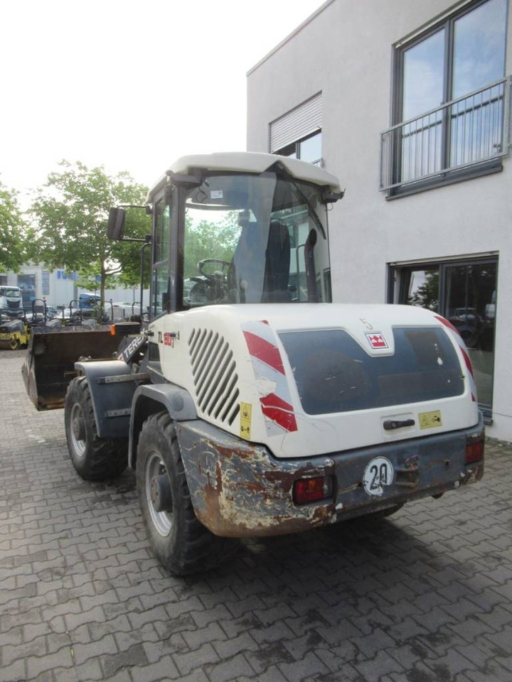 Terex TL80 Klappschaufel Gabel - Gumikerekes homlokrakodó: 4 kép. Terex TL80 Klappschaufel Gabel - Gumikerekes homlokrakodó: 4 kép.