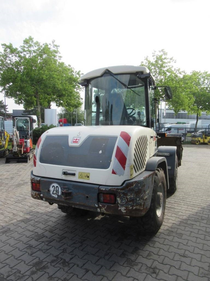 Terex TL80 Klappschaufel Gabel - Gumikerekes homlokrakodó: 3 kép. Terex TL80 Klappschaufel Gabel - Gumikerekes homlokrakodó: 3 kép.
