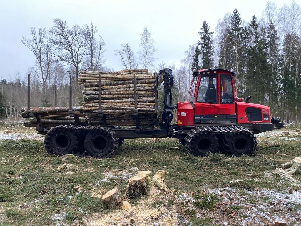 Komatsu 855 - Kihordó: 3 kép. Komatsu 855 - Kihordó: 3 kép.