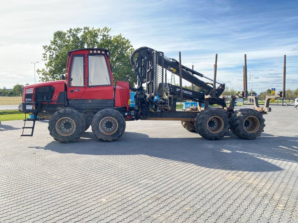 Komatsu 855  - Kihordó: 2 kép. Komatsu 855  - Kihordó: 2 kép.