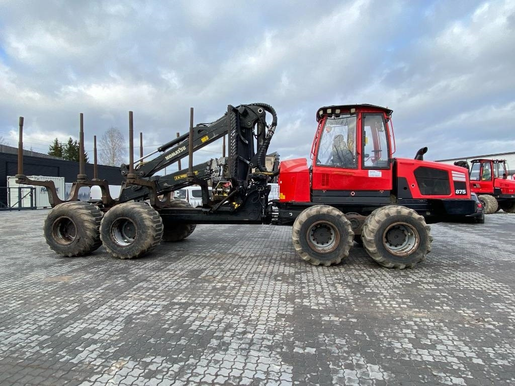 Komatsu 875 - Kihordó: 3 kép. Komatsu 875 - Kihordó: 3 kép.