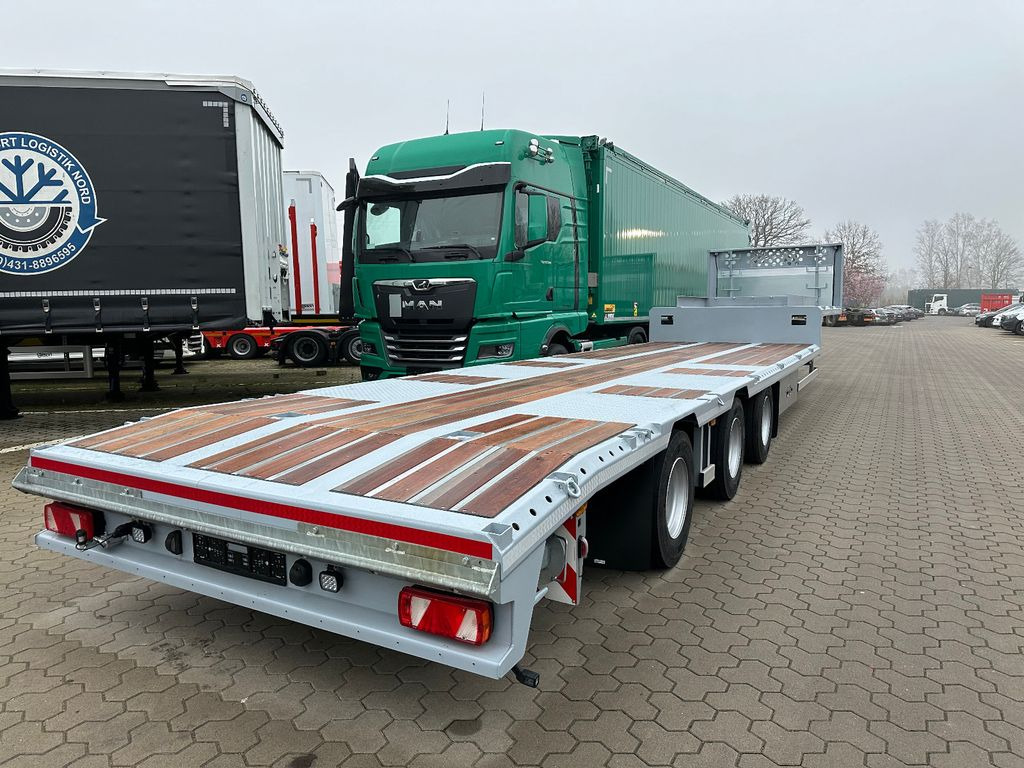 3-Achser Tieflader Zwangslenkung Betonteile - Félpótkocsi mélybölcsős: 4 kép. 3-Achser Tieflader Zwangslenkung Betonteile - Félpótkocsi mélybölcsős: 4 kép.