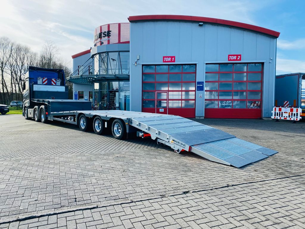 Gabelstapler/Arbeitsbühnentransporter Klapprampe - Félpótkocsi mélybölcsős: 5 kép. Gabelstapler/Arbeitsbühnentransporter Klapprampe - Félpótkocsi mélybölcsős: 5 kép.