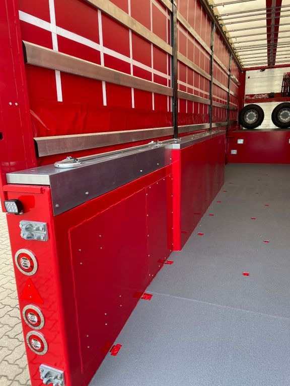 Innenlader Zwischenlader Gabelstaplertransporter - Félpótkocsi mélybölcsős: 3 kép. Innenlader Zwischenlader Gabelstaplertransporter - Félpótkocsi mélybölcsős: 3 kép.