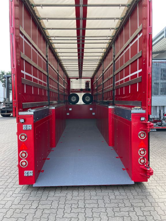 Innenlader Zwischenlader Gabelstaplertransporter - Félpótkocsi mélybölcsős: 4 kép. Innenlader Zwischenlader Gabelstaplertransporter - Félpótkocsi mélybölcsős: 4 kép.